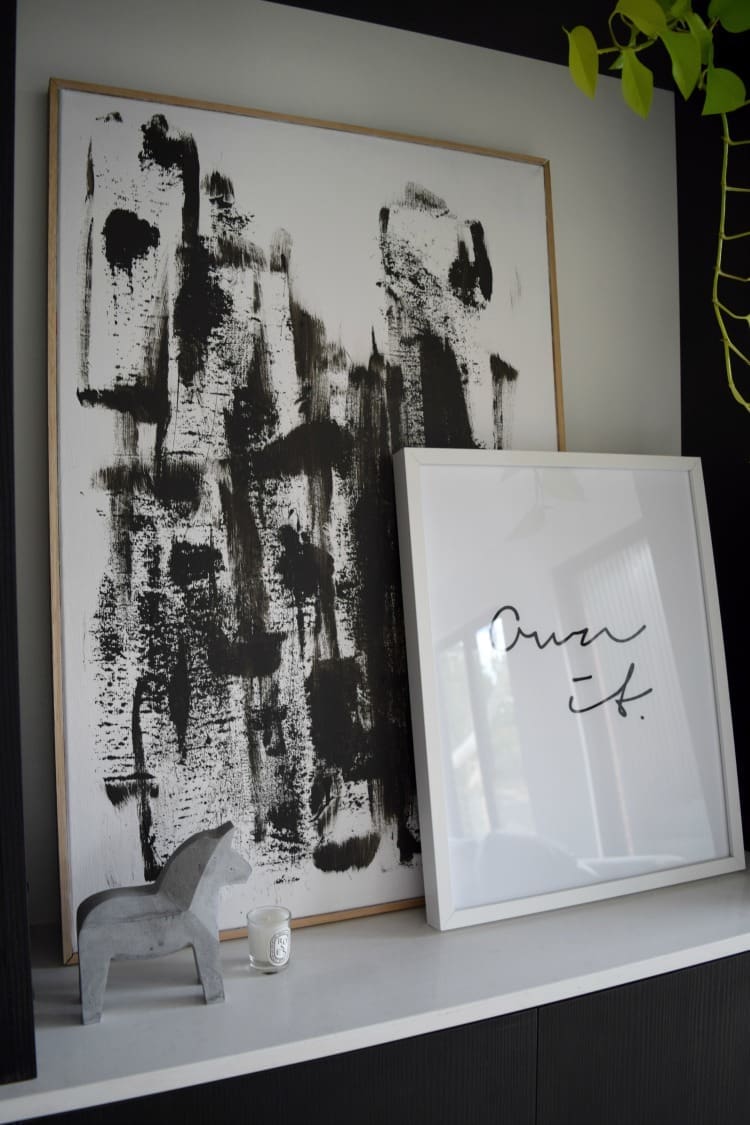 Black and white artwork styled in home