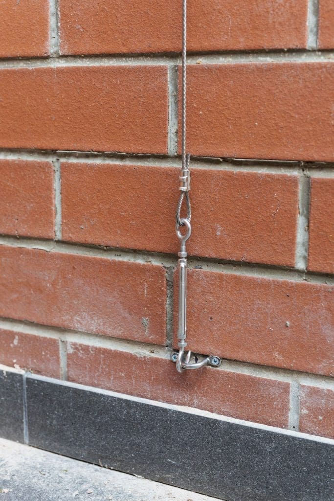 Hook attached to wall bracket