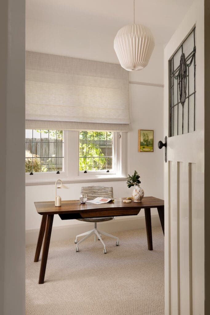 Modern home office with statement pendant light