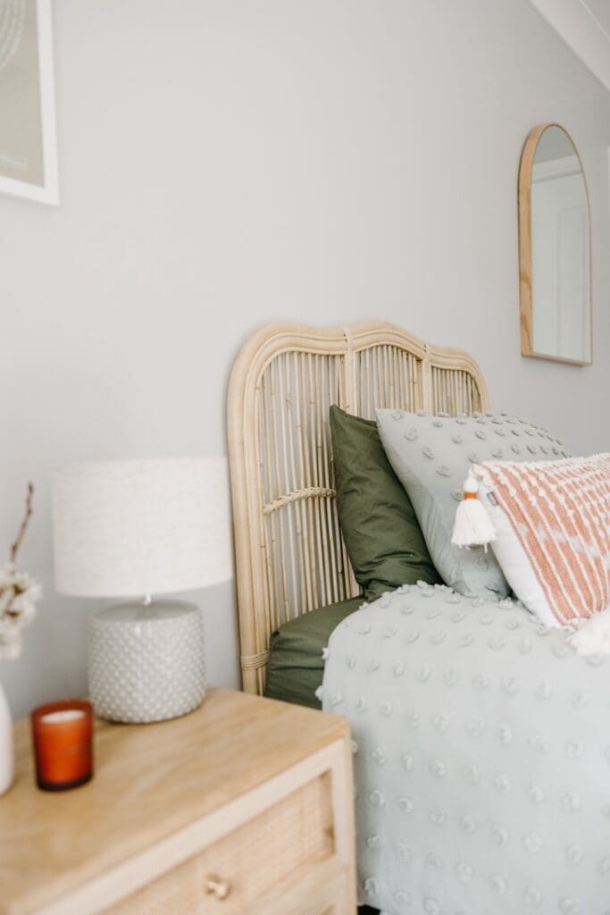 Rattan bedhead in guest bedroom
