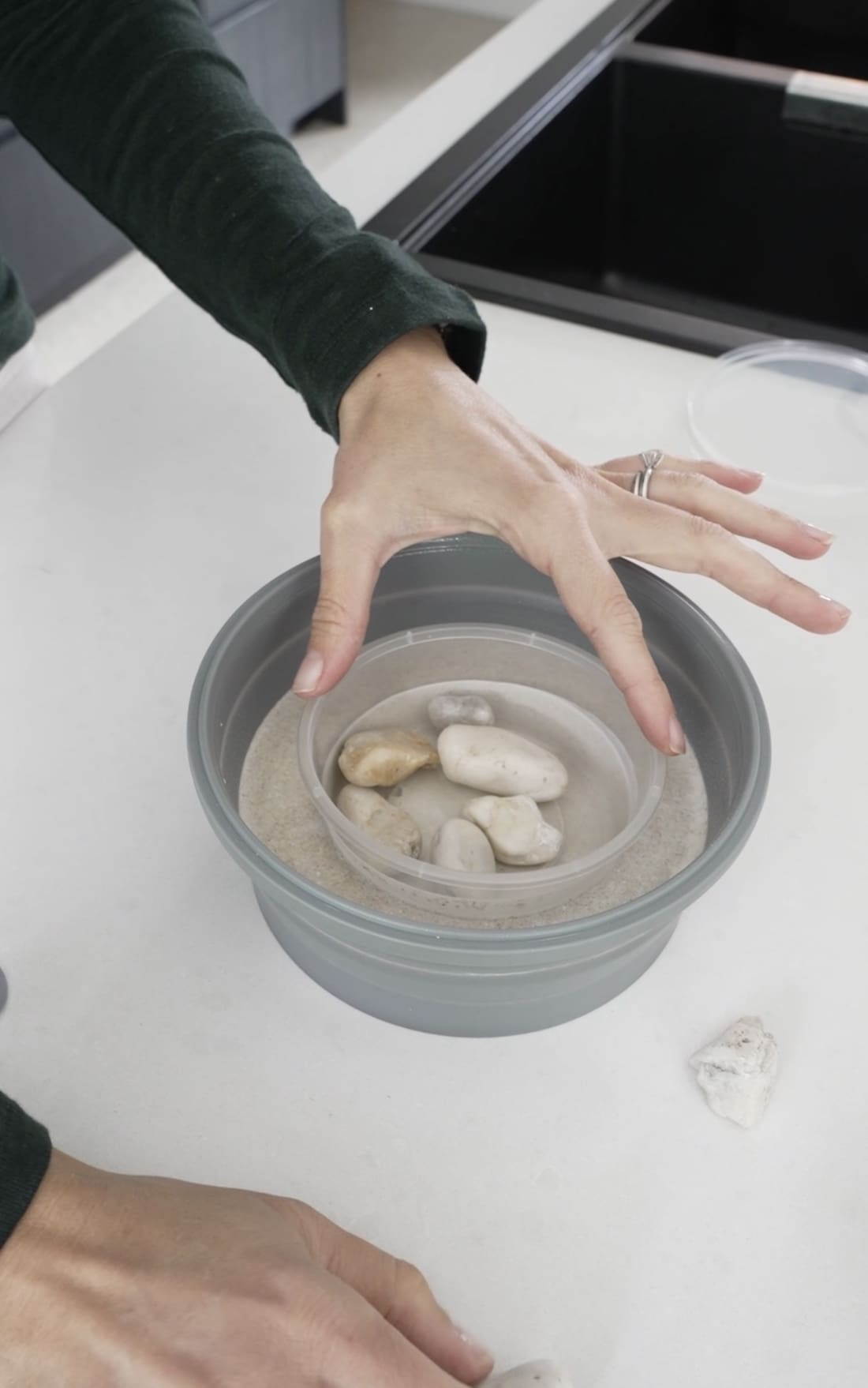 Press plastic container into cement