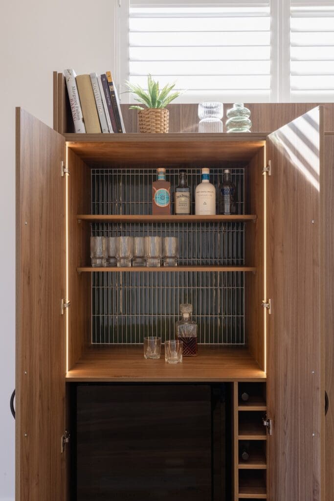 Home bar cabinet with feature tile backing
