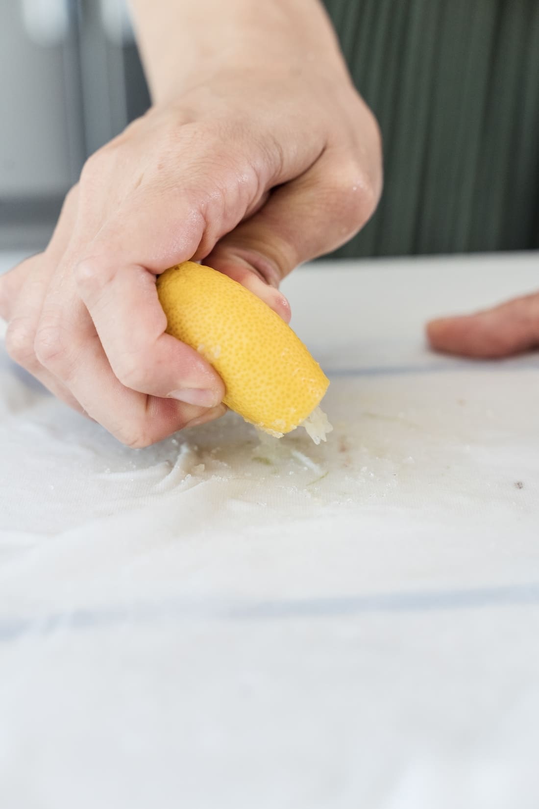 Squeeze lemon onto stain