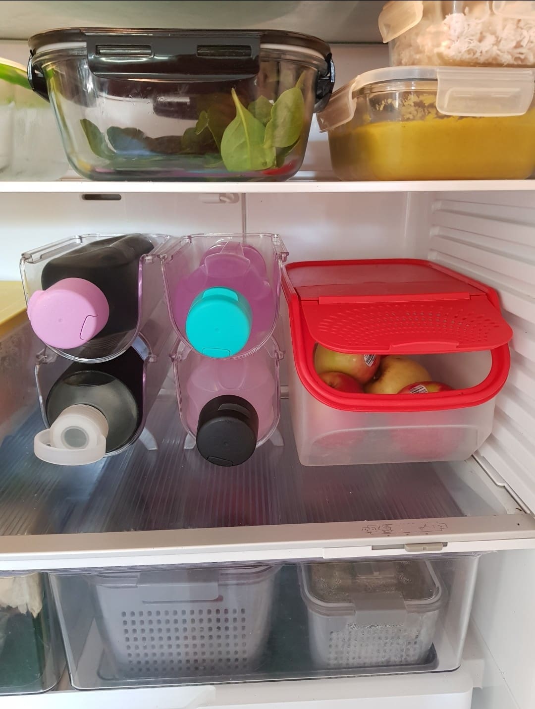 Stacked wine holders in fridge