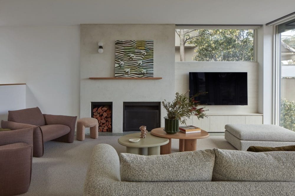 Living room with plush sofas and fireplace