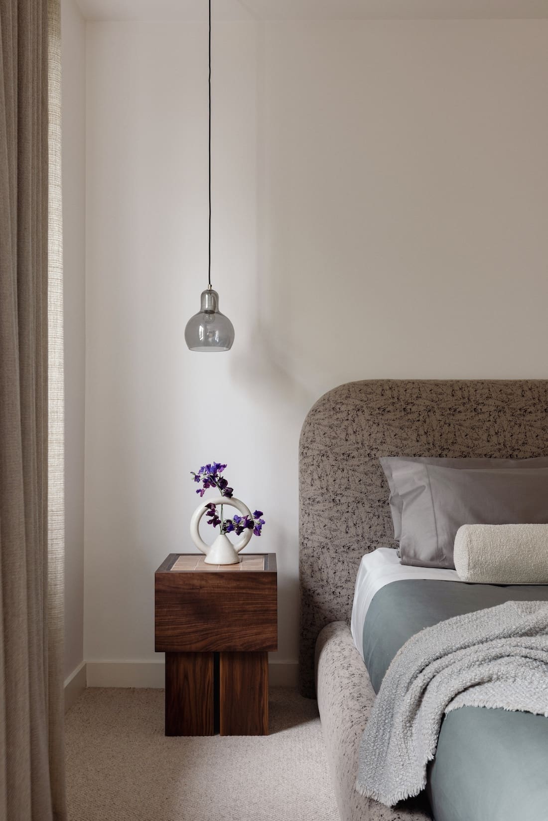Bedroom after the makeover in this Mount Martha home by Studio Esar