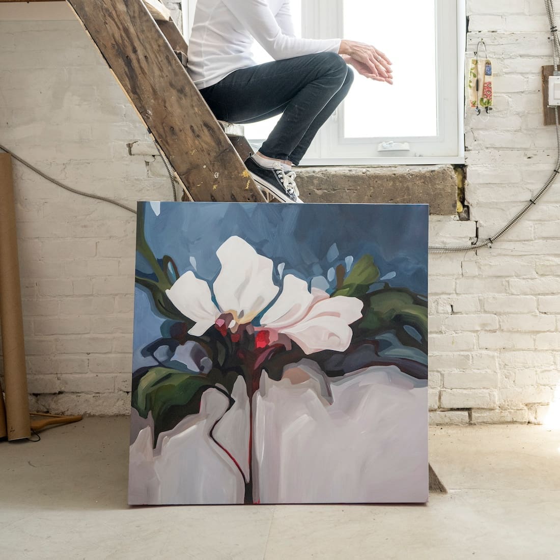 Floral art propped up against stairs from Susannah Bee Art