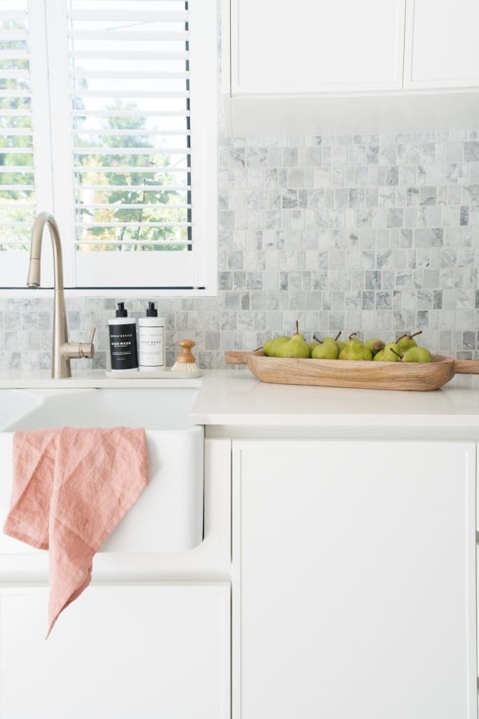 Tea towel draped over kitchen sink