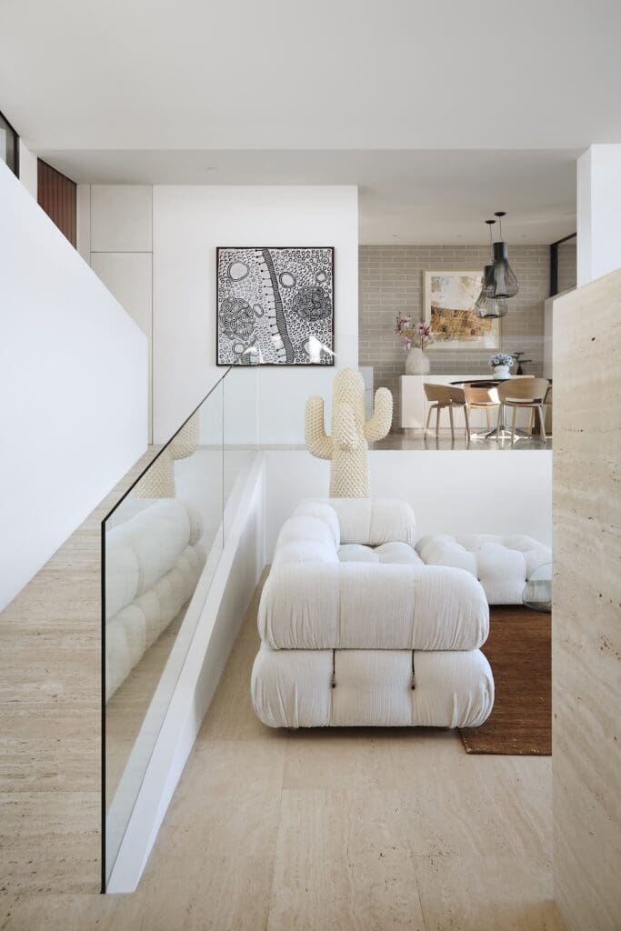 White modular sofa in quirky mid-century modern living room