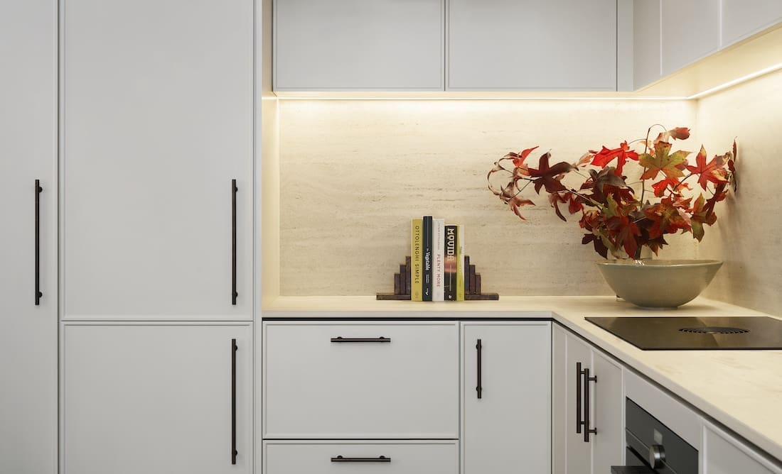 Kitchen cabinetry and bench styling in Tribeca Brewery apartment by The Stylesmiths