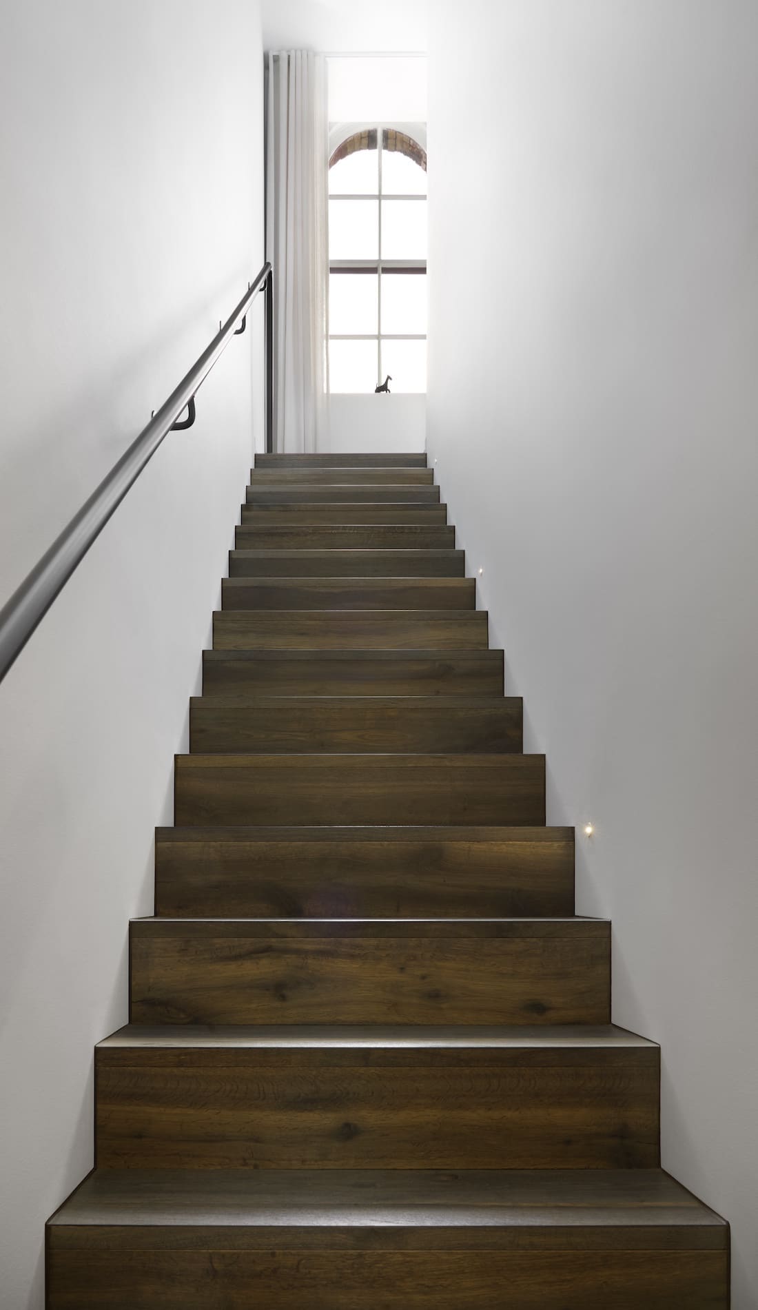 Timber staircase in Tribeca Brewery apartment by The Stylesmiths