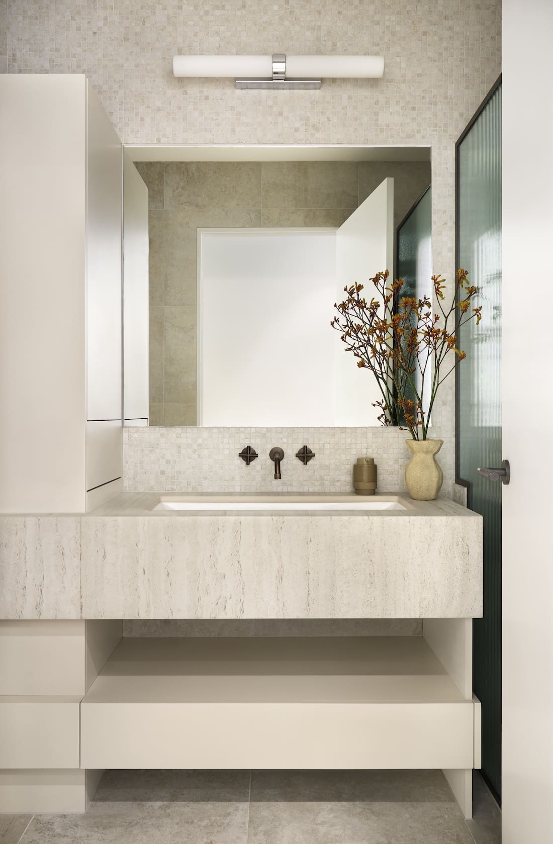 Vanity in bathroom of Tribeca Brewery apartment by The Stylesmiths