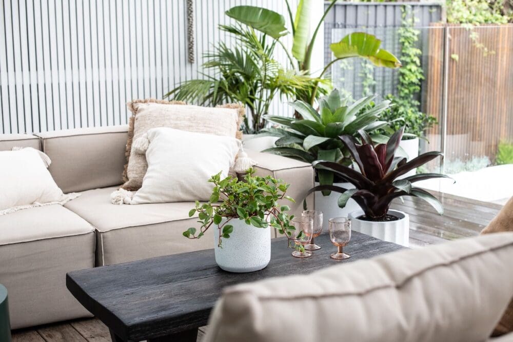 Simple ceramic planter on wooden table