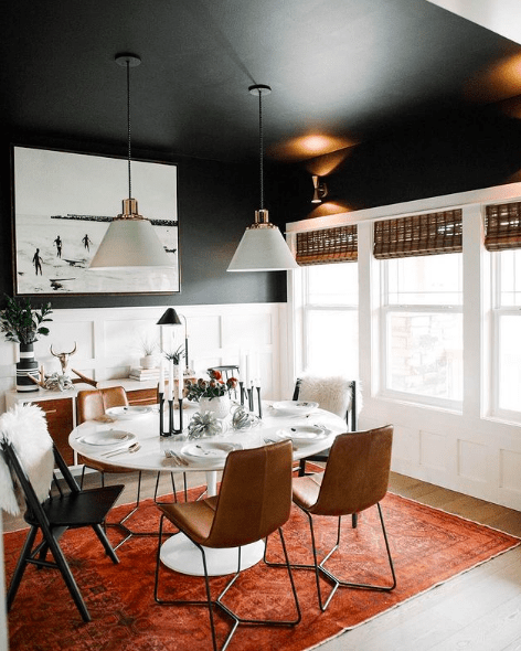 Black feature wall in dining room