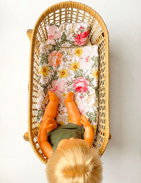 Kmart planter turned dolls bed