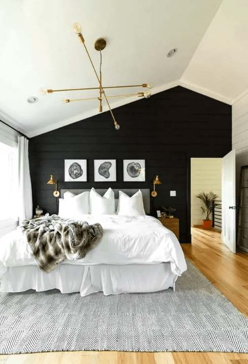 Black shiplap wall in bedroom